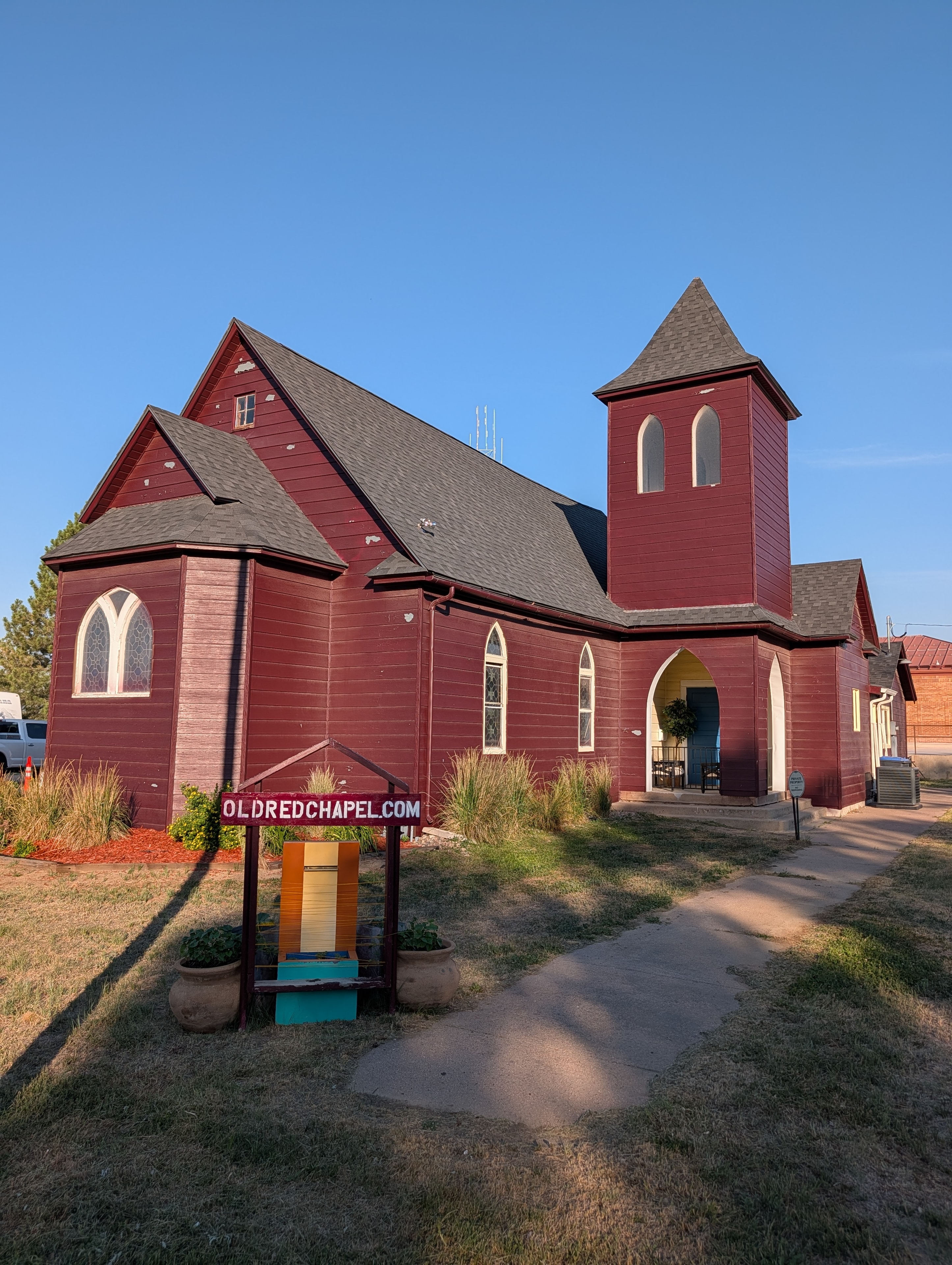 Old Red Chapel full exterior in daylight with steeple and arched entrance