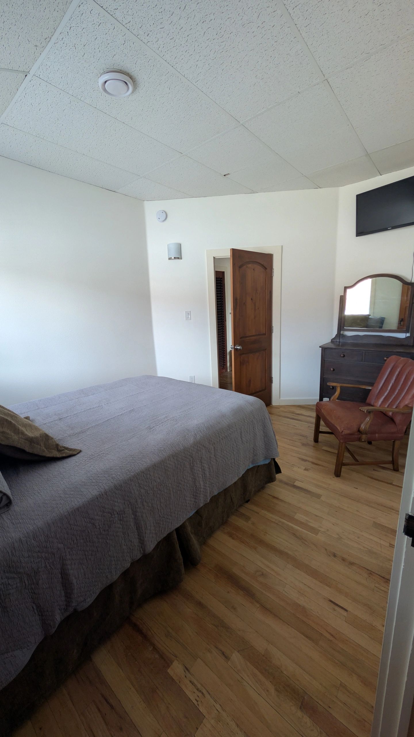 Bedroom with gray bedding