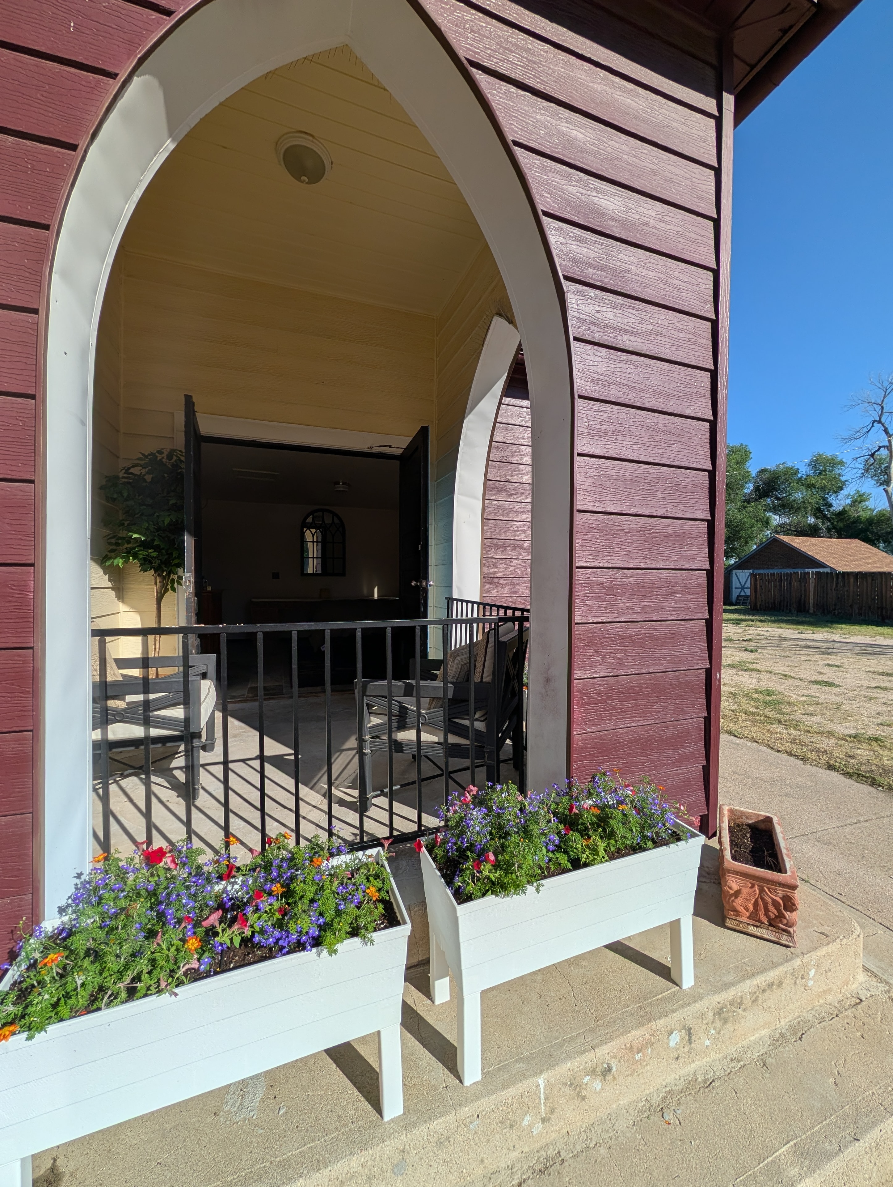 Chapel entrance archway with flower planters