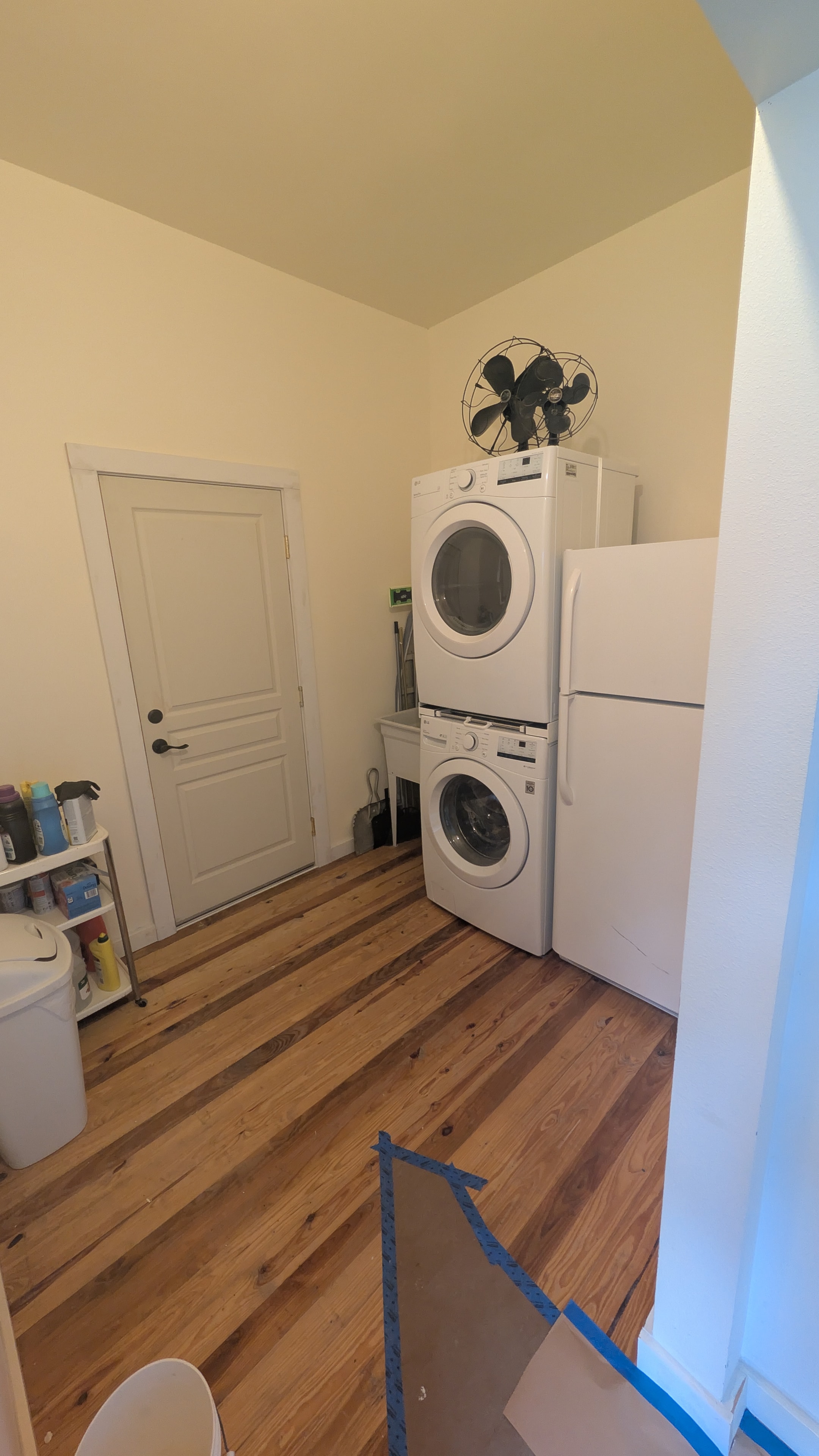 In-unit laundry with stacked washer and dryer